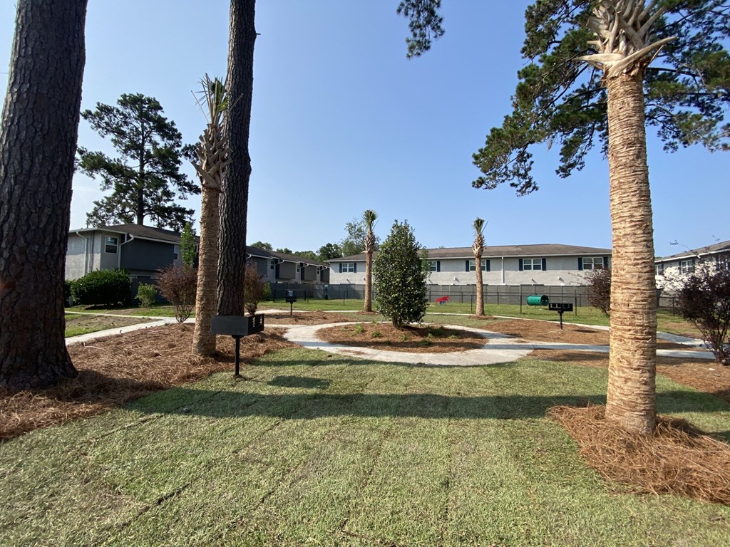 the view of a park with trees and buildings at Crescent Place Apartments, Georgia
