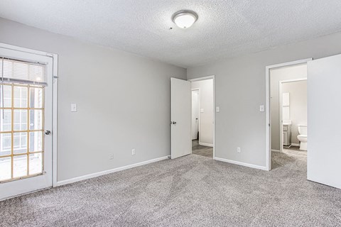 Carpeted Living Area at Wildcreek Apartments, Georgia 30021