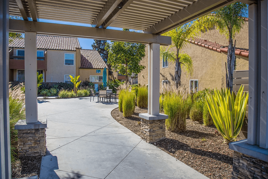 an outdoor patio area at the preserve at tampa palms apartments in tampa