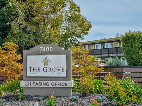 the grove leasing office sign