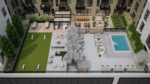 A large outdoor patio area with a pool and seating area.