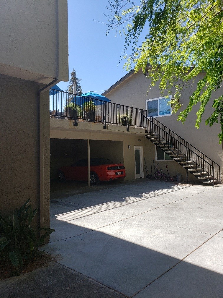 a car is parked in the garage of a house