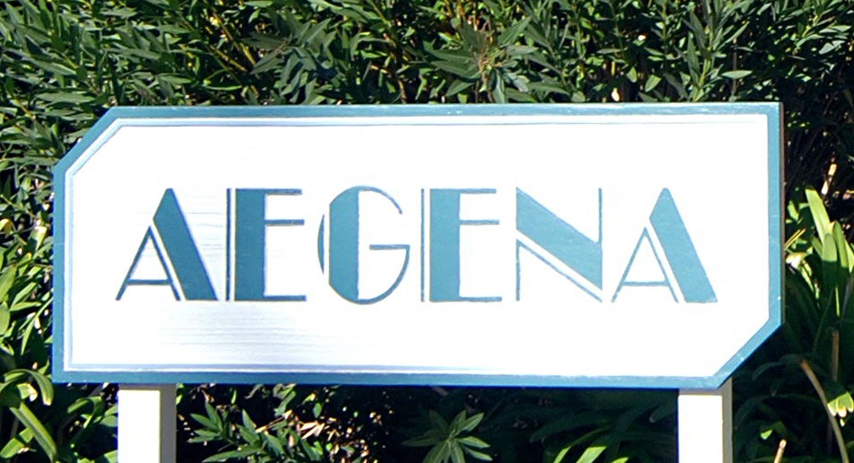 The Aegena sign a white sign with green letters in front of a green plant wall Prodesse Property Group 1211 Garbo Way  San Jose, CA 95117