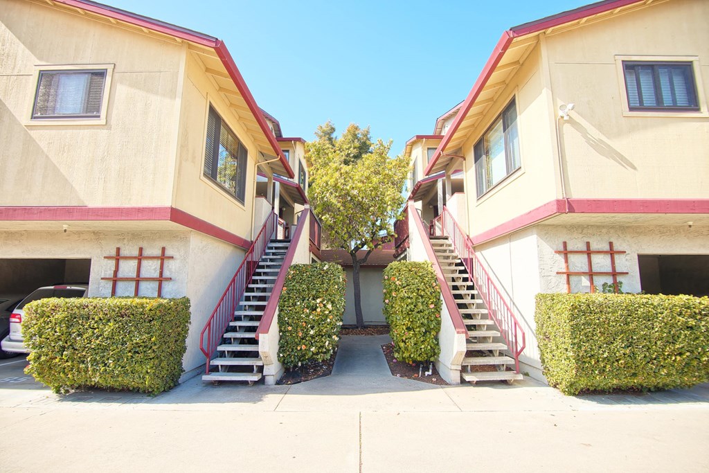 a row of apartments with stairs