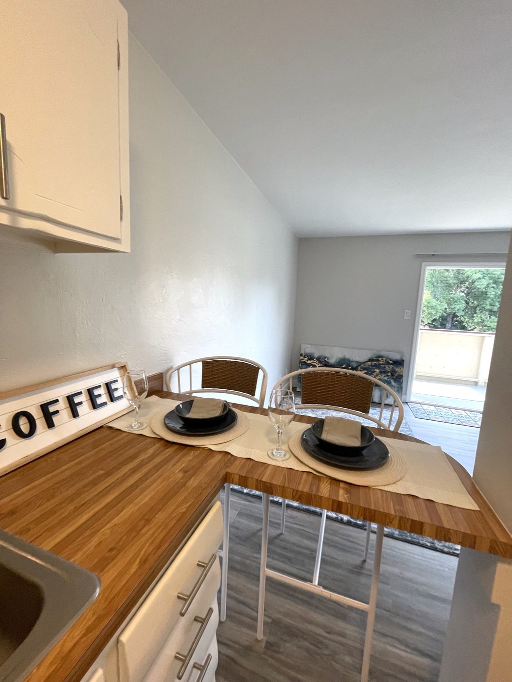the kitchen and dining area of a small apartment