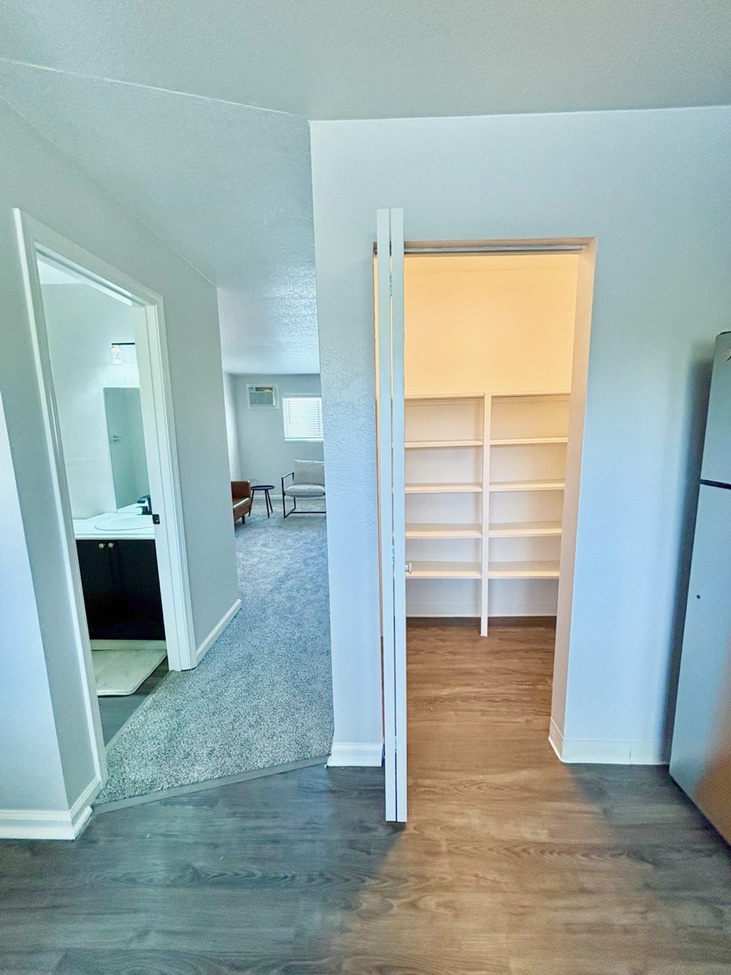 Campbell Plaza Apartments
710 Nido Drive, Campbell, CA 95008. A room with a white door and a white shelving unit.