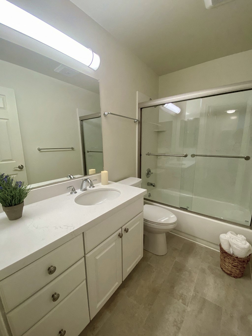a bathroom with a sink toilet and a shower