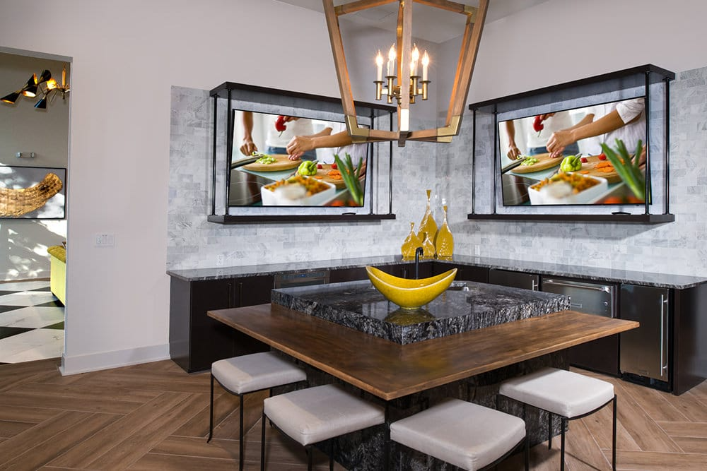 a dining room with a table and chairs
