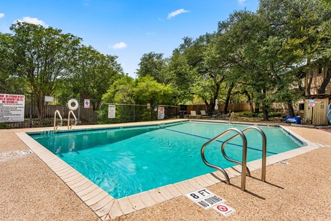 A small pool with a sign that says 8F.