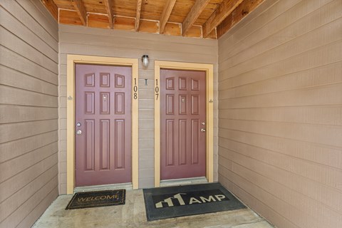 Two doors with the numbers 1108 and 1107 on them.