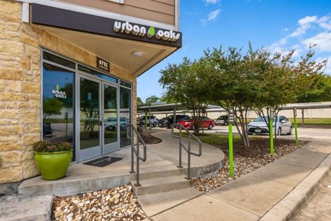 The image shows the front of a building with the sign Urban Outfitters.