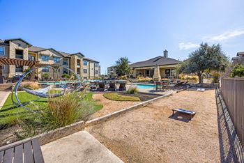 playground and a pool. at The Royce at 8100, Texas