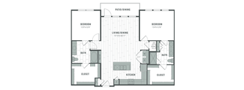 A floor plan of a house with two bedrooms, a living area, a kitchen, two bathrooms, and two closets.