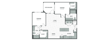 A floor plan of a house with a living room, two bedrooms, a bath, a kitchen, a dining room, and a closet.