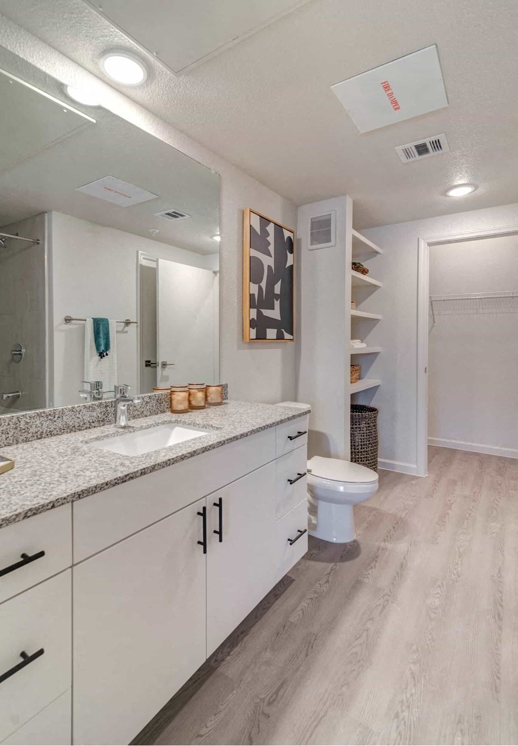 a bathroom with a sink and a toilet
