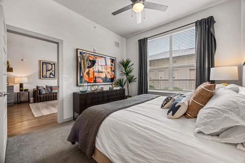 Bedroom With Ceiling Fan at The Haywood Apartments, Austin