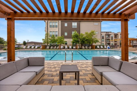 Poolside Relaxing Area at The Haywood Apartments, Texas