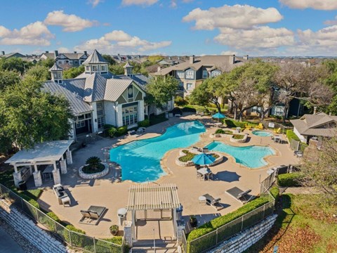 Ariel view of Bridge at SoCo Crossing's clubhouse and pool.