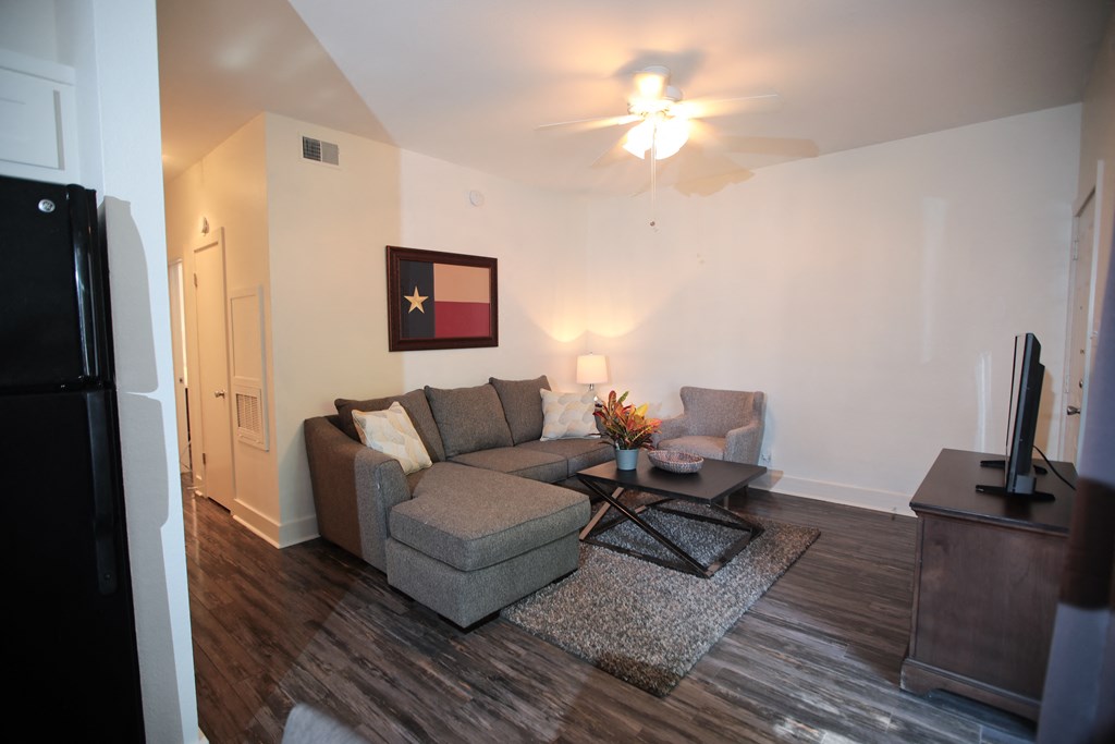 a living room with a couch and a coffee table