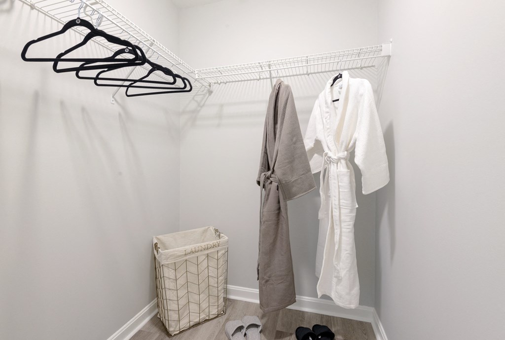 a walk in closet in a 555 waverly unit