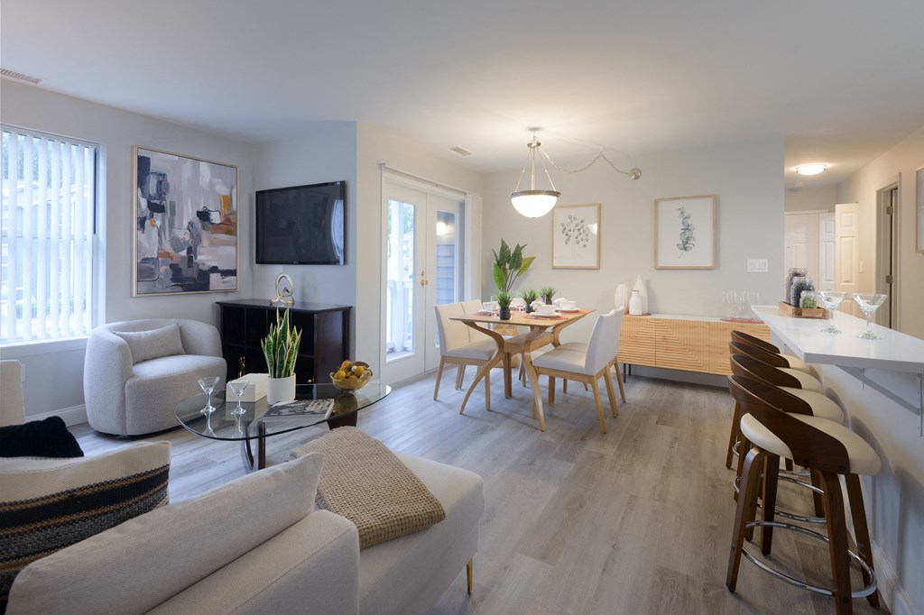 a view of the living room and dining room