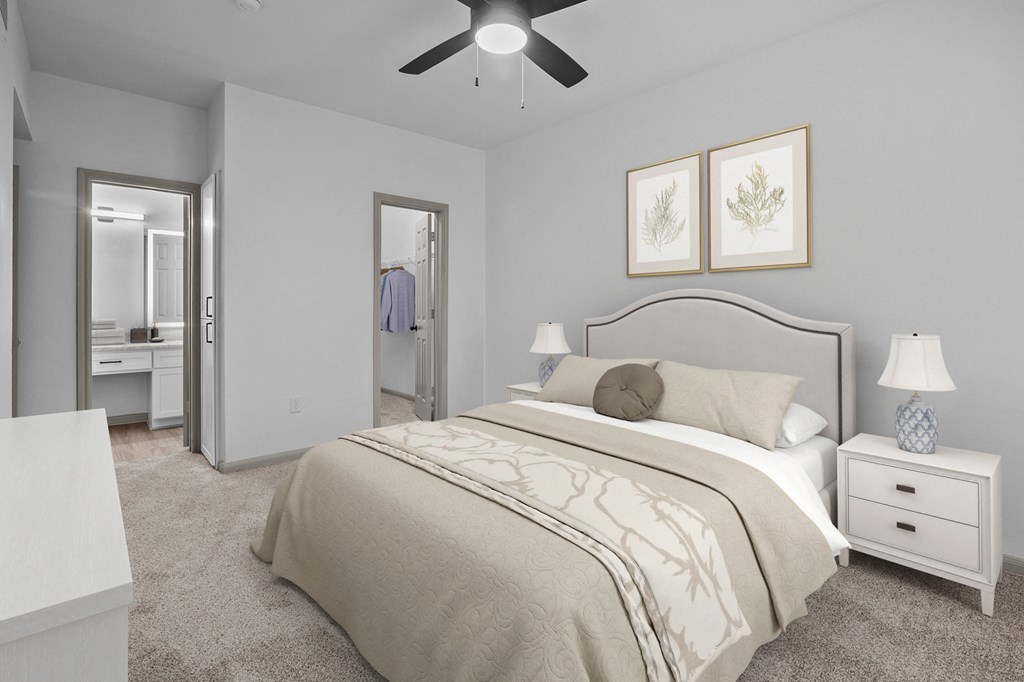 a white bedroom with a white bed and a white dresser