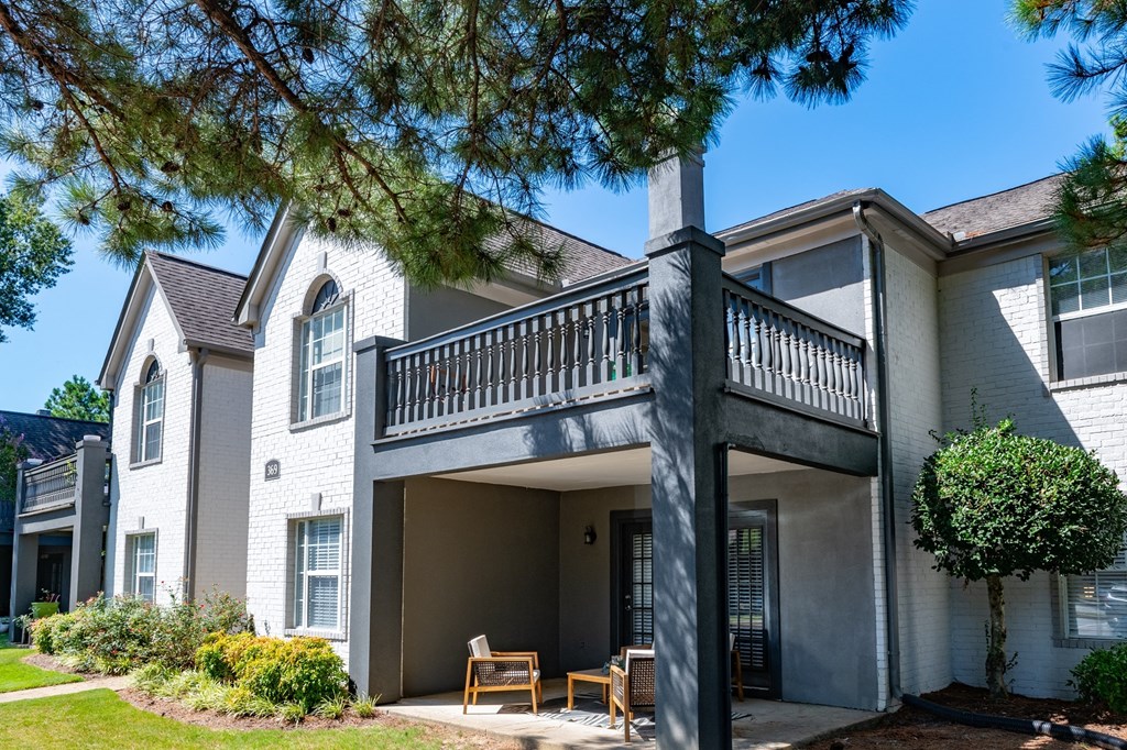 the view of a house with a balcony and a tree  at The Addison at Collierville, Collierville, TN, 38017