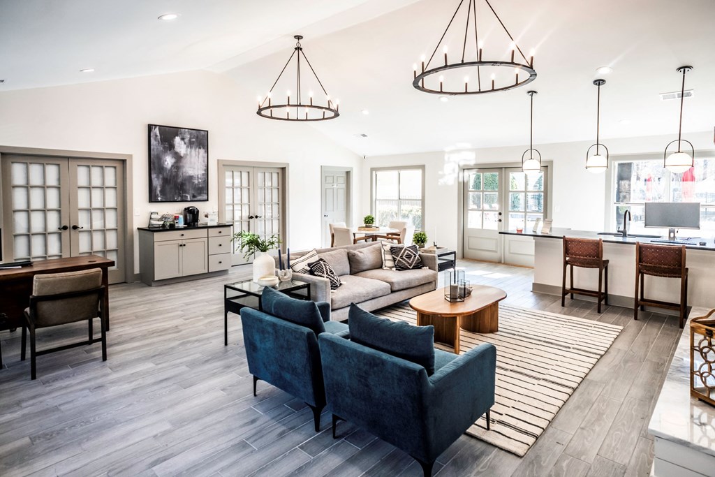 Modern clubhouse with ample seating located at Addison on Cobblestone located in Fayetteville, GA 30215