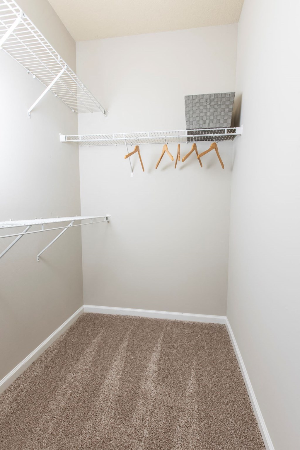 Model primary bedroom closet  at Ansley at Town Center in Evans GA