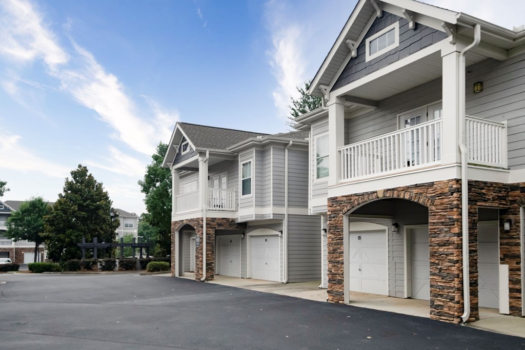 A row of townhouses with garages and balconies at Ansle at Town Center Apartments, Evans, 30809
