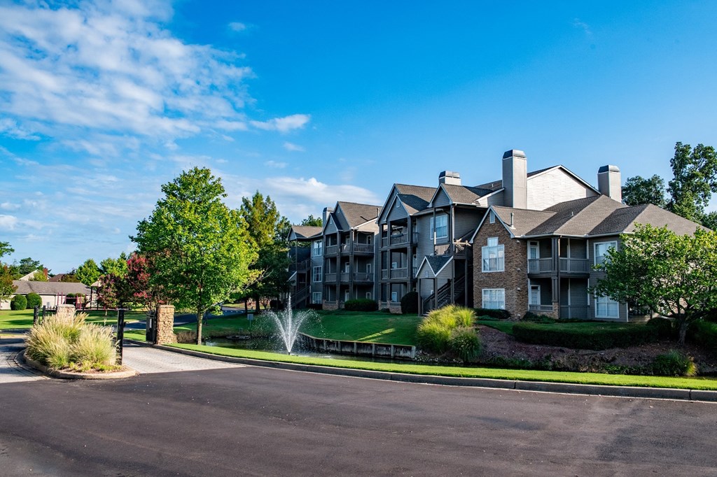an apartment building with a fountain in front of it at Appling Lakes, Tennessee, 38016