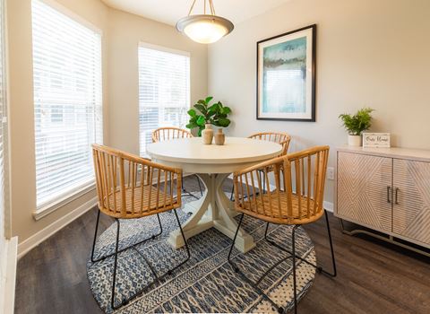 Renovated Dining Room with Wood Style Flooring Image at Arbors Harbor Town, Memphis, TN