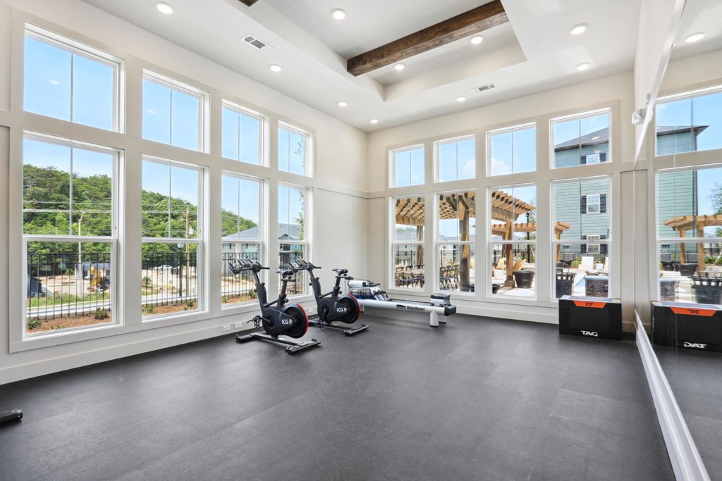 A spacious room with a treadmill and exercise bike at Arcadia Cartersville Apartments, Cartersville, GA