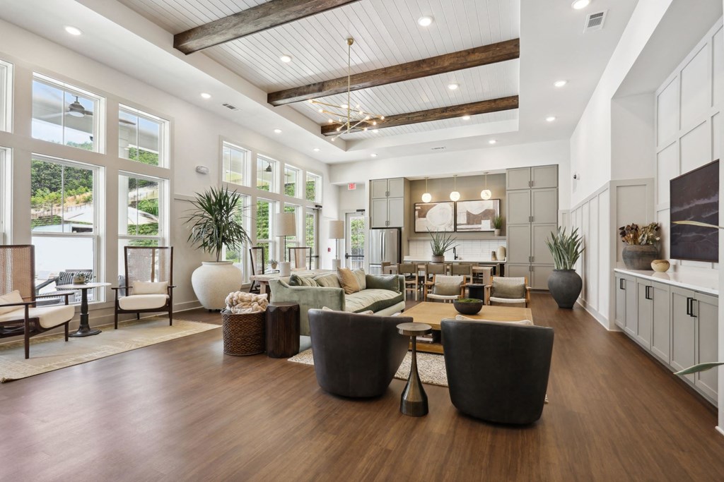 A spacious living room with a high ceiling and wooden floors. at Arcadia Cartersville Apartments, Cartersville, GA, 30121