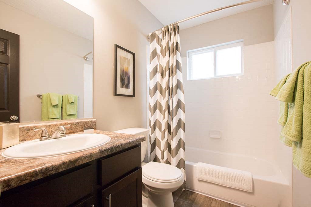 Relax in your bathroom with large soaking tub and shower at Artesian East Village, Atlanta, GA 30316