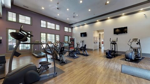 fitness center with exercise equipment