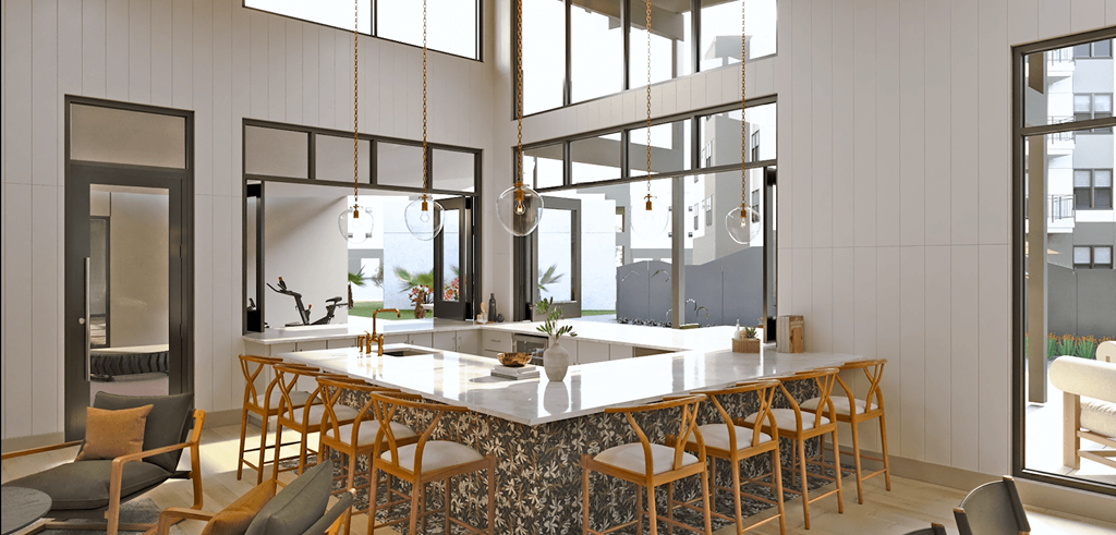 a kitchen with a marble counter top and chairs at Livano Avondale, Avondale, 85323 