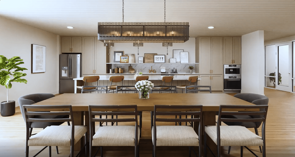 a dining room with a large table and chairs