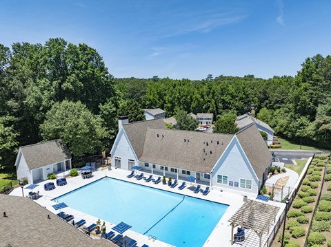 A large white building with a pool at Dunwoody Glen, Atlanta, 30360