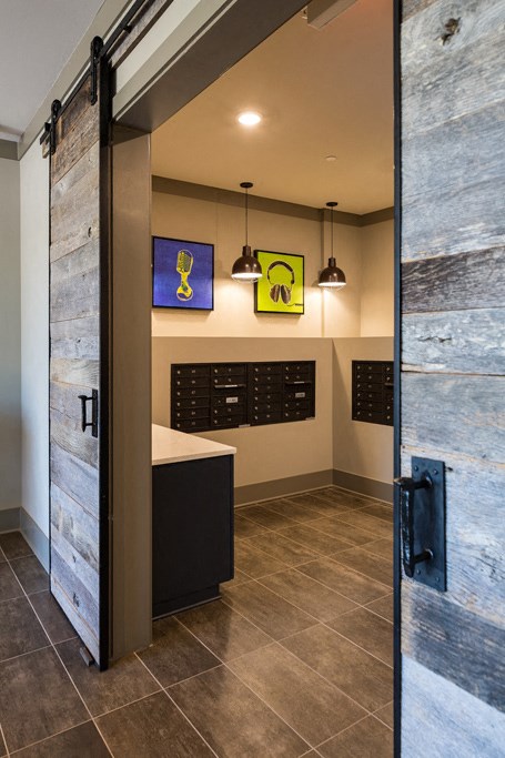 Indoor Mail Room with Mailboxes for Residents at Echo at North Pointe Center Apartment Homes, Alpharetta, GA 30009