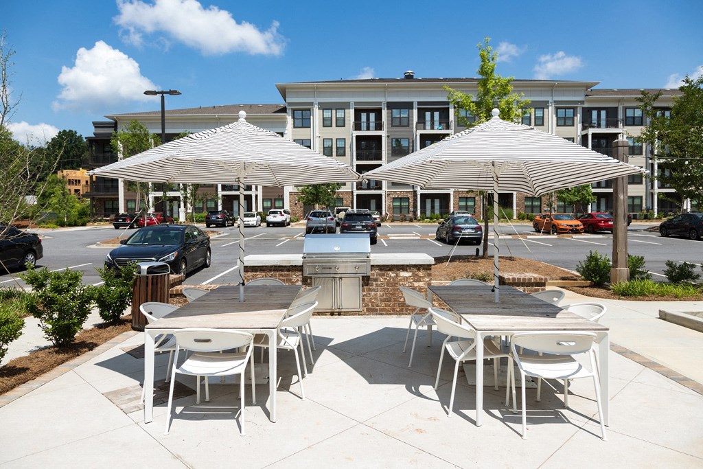 Gorgeous Modern Pool with Sunshelf and Lounge Chairs for Relaxing at Echo at North Pointe Center Apartment Homes, Alpharetta, GA 30009