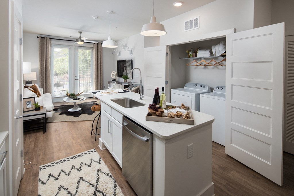 Open-Concept Kitchens with Quartz Countertops and Classic Shaker Cabinets at Echo at North Pointe Center Apartment Homes, Alpharetta, GA 30009