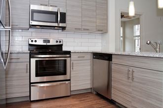 Model kitchen at Fifth Street Place Apartments, Virginia, 22903 - Photo Gallery 4