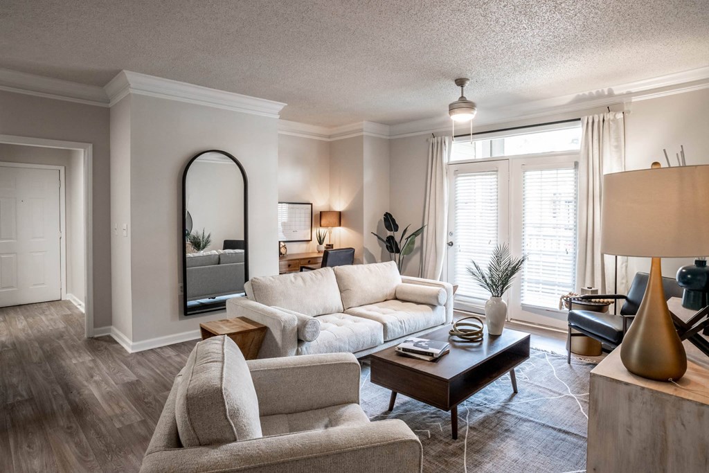 a living room filled with furniture and a large window at Appling Lakes, Cordova, TN