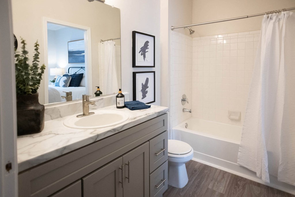 a bathroom with a toilet sink and bathtub at Appling Lakes, Tennessee