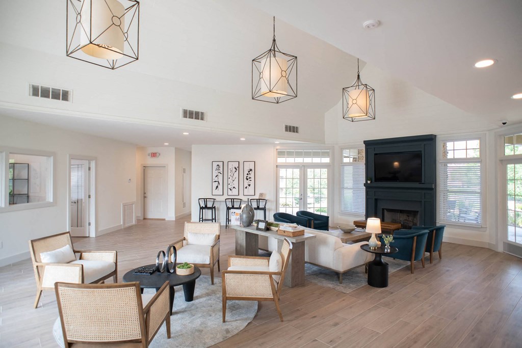a living room filled with furniture and a large fireplace at Appling Lakes, Tennessee, 38016