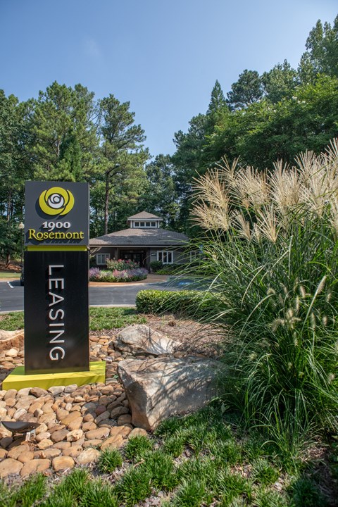 a sign at the entrance of a park with a creek at 1900 Rosemont, Roswell, 30076