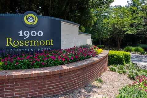a brick retaining wall with a sign for rosenmont apartment homes at 1900 Rosemont, Roswell, 30076