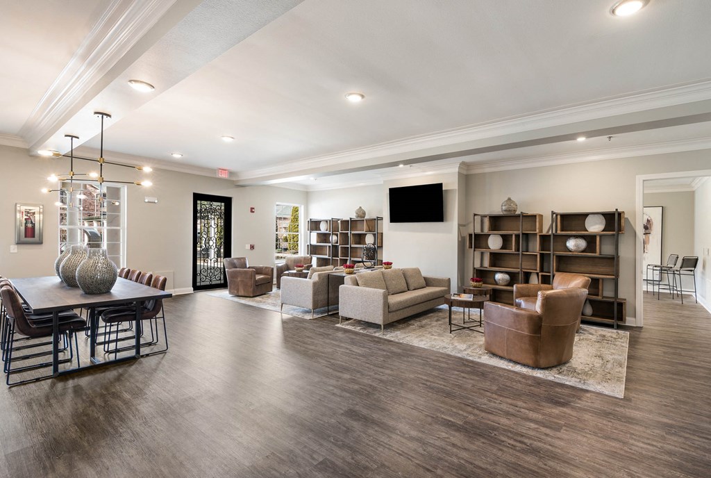 a living room with couches and chairs and a table at Arlo Luxury homes Apartments, Little Rock, 72210