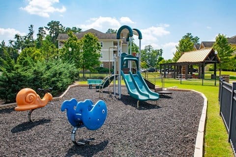 Children have a place to run and play at Alden Place too! Slides, Climbing Equipment and Bike Parking at Ashby at Ross Bridge, Hoover, AL 35226